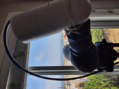 Spotting Scope with Mesh IP Camera & Boat in Distance